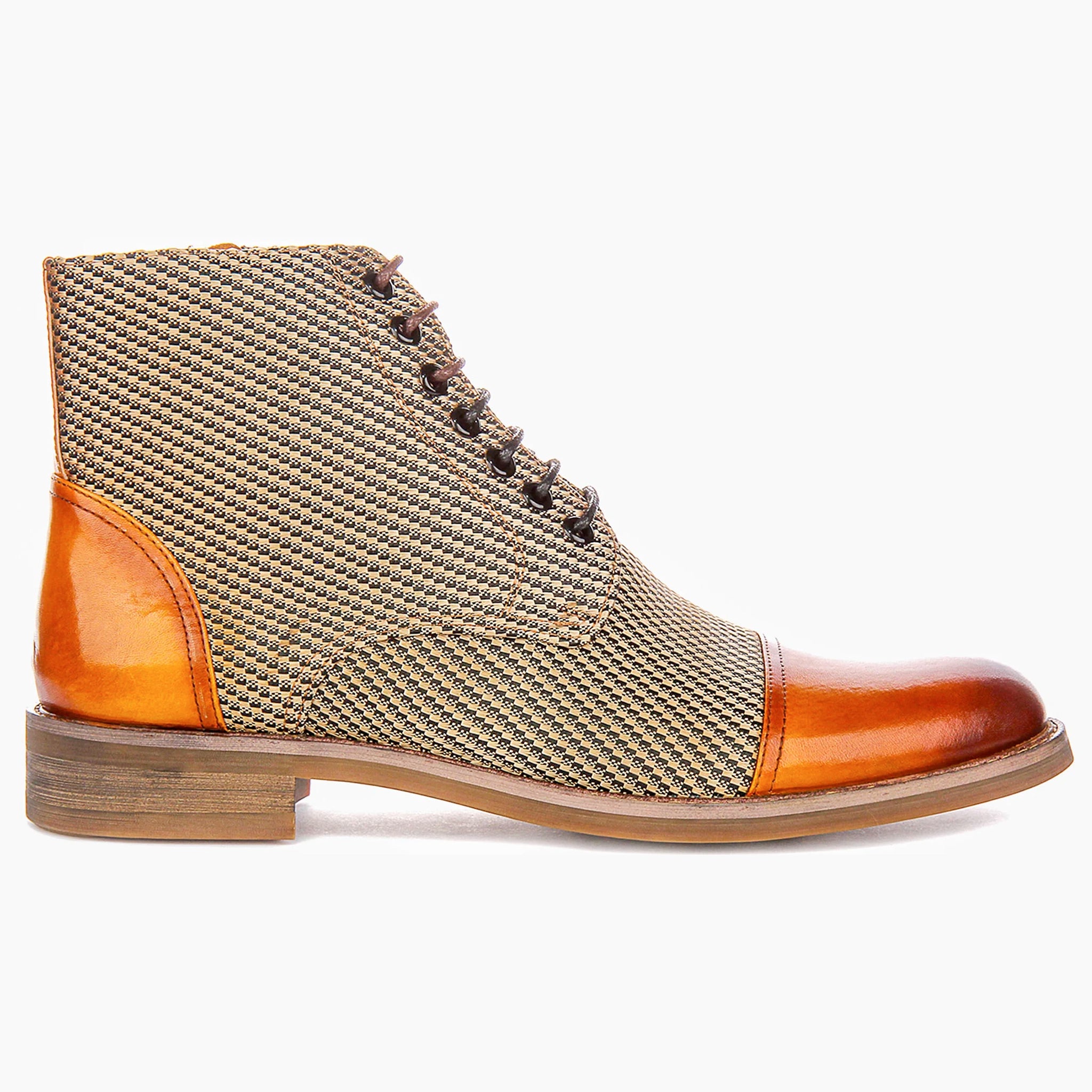 Brown and orange patterned shoe on a white background